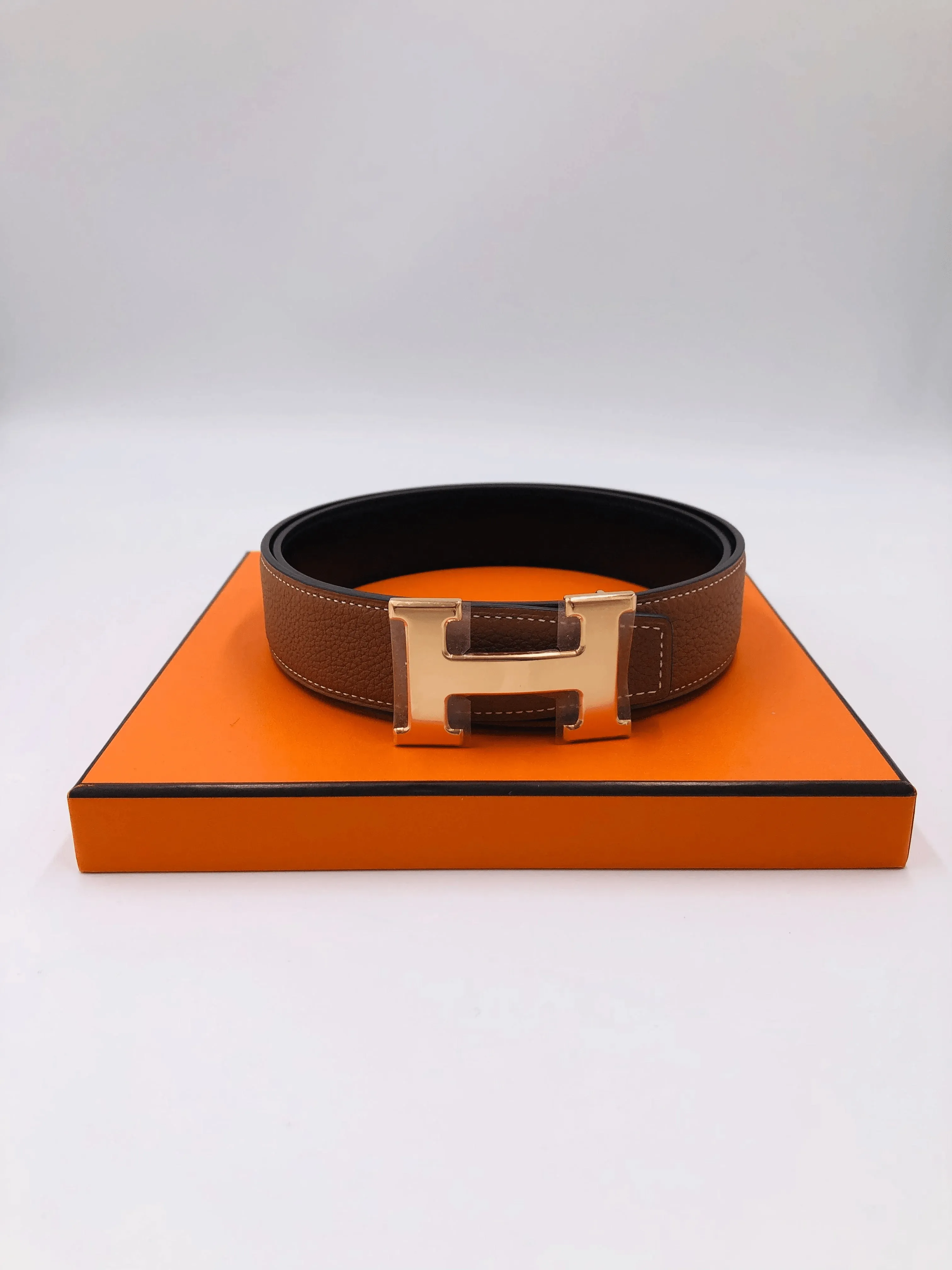 HERMÈS H ROSE GOLD BELT BUCKLE WITH LEATHER REVERSIBLE STRAP Gold & Black