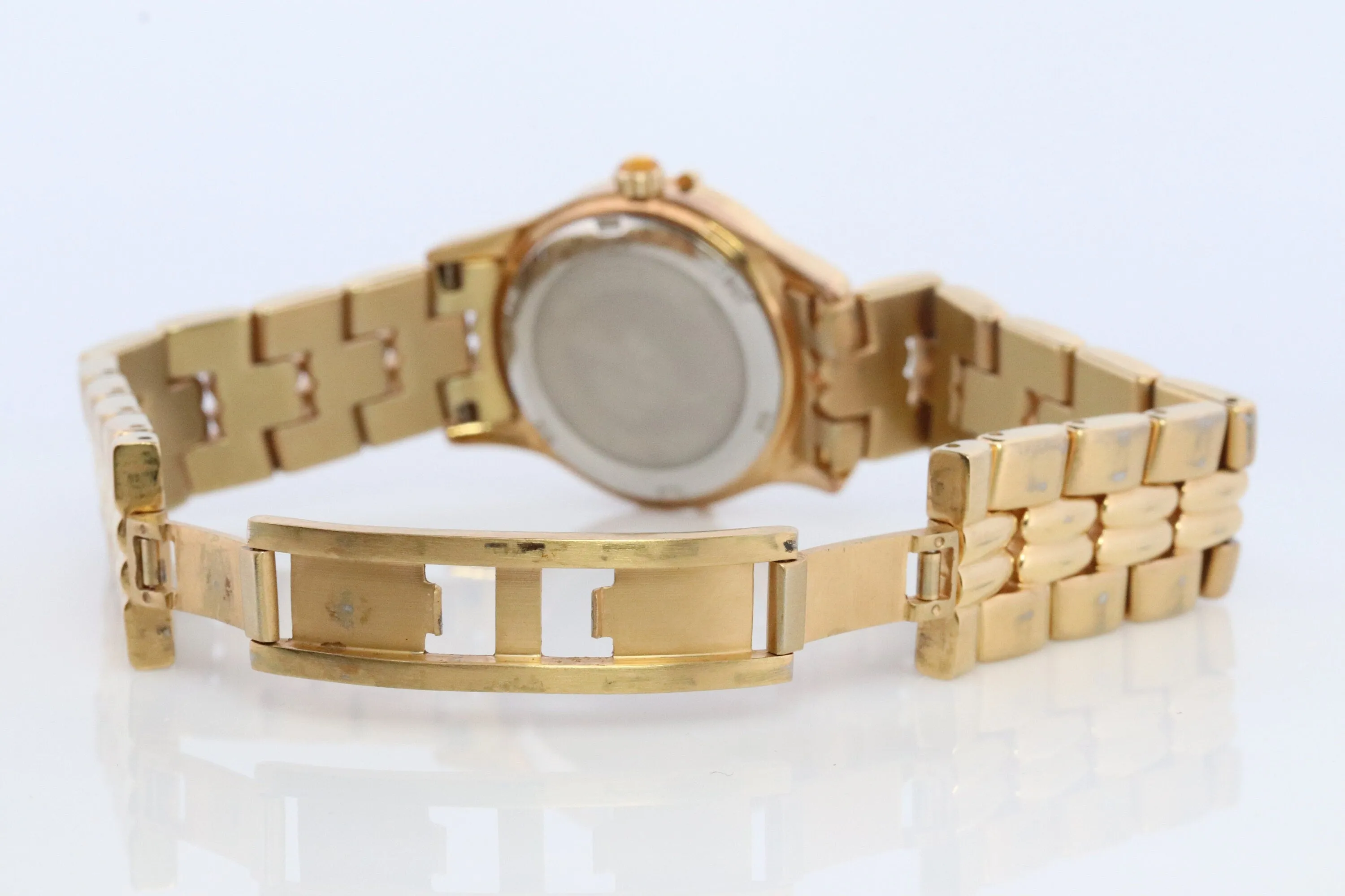 Lucien Piccard  watch Ladies. Stainless Steel Gold Tone with Sapphires and MOP Face. Women's Lucien Piccard watch.