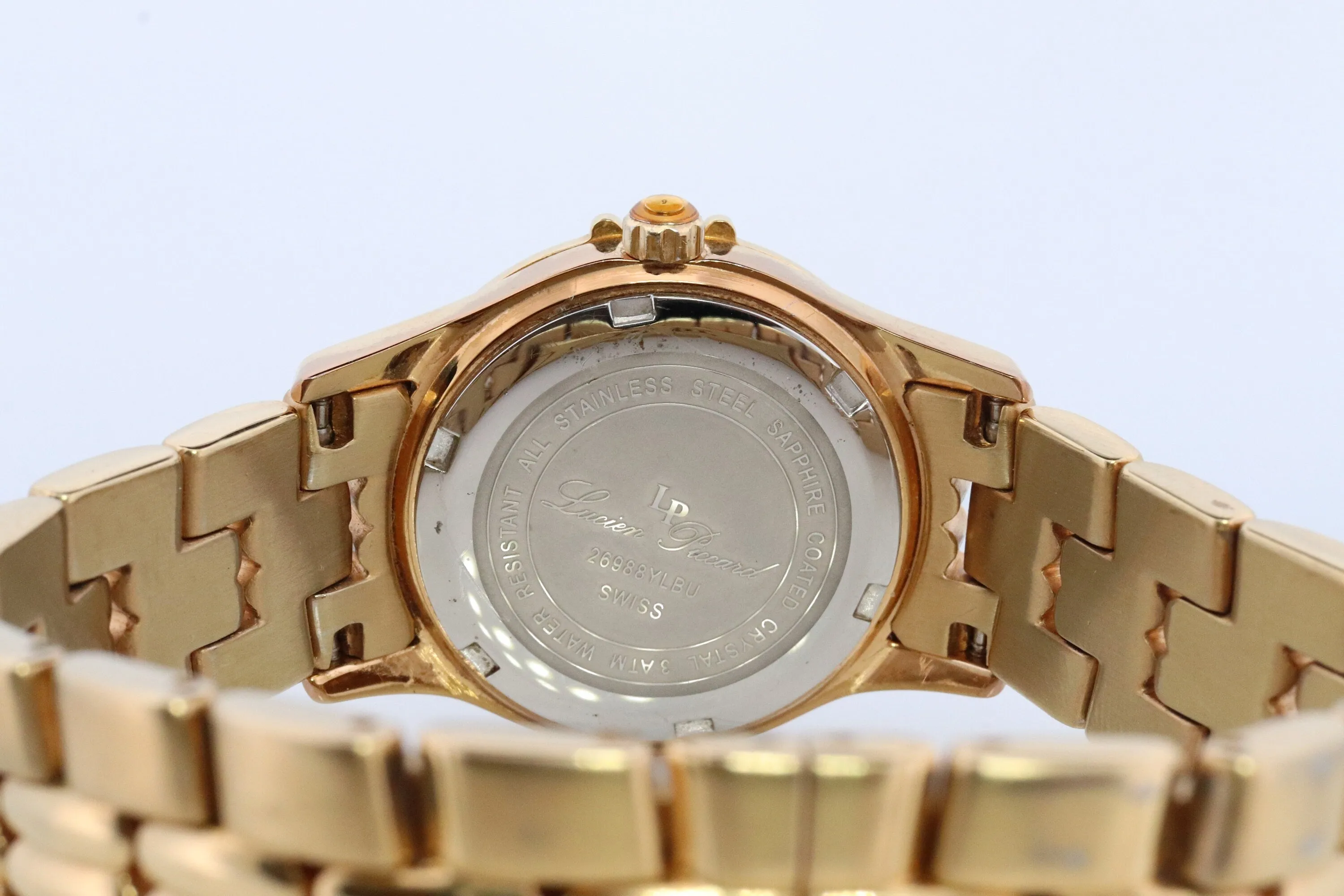 Lucien Piccard  watch Ladies. Stainless Steel Gold Tone with Sapphires and MOP Face. Women's Lucien Piccard watch.