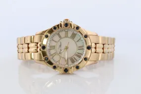 Lucien Piccard  watch Ladies. Stainless Steel Gold Tone with Sapphires and MOP Face. Women's Lucien Piccard watch.