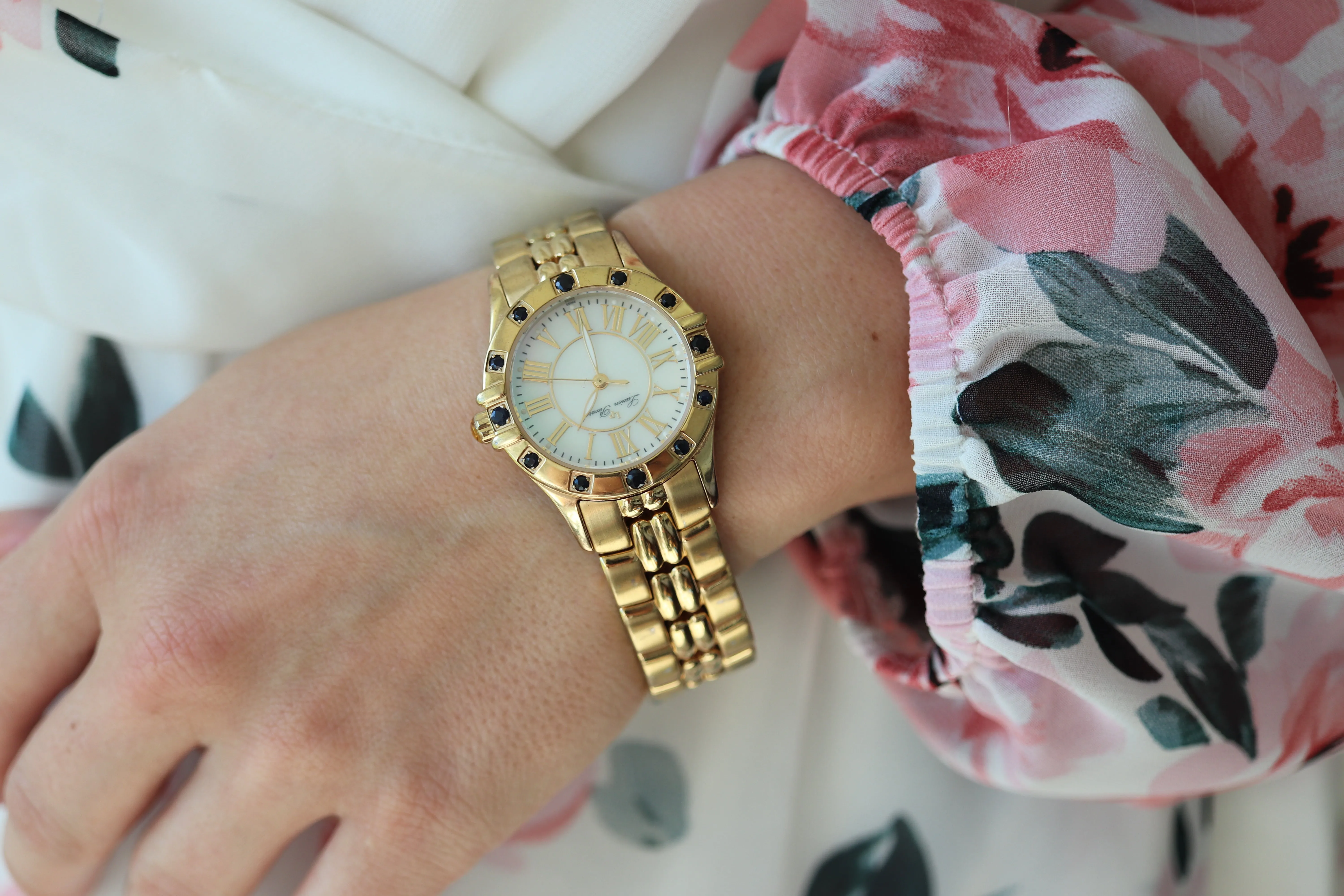 Lucien Piccard  watch Ladies. Stainless Steel Gold Tone with Sapphires and MOP Face. Women's Lucien Piccard watch.